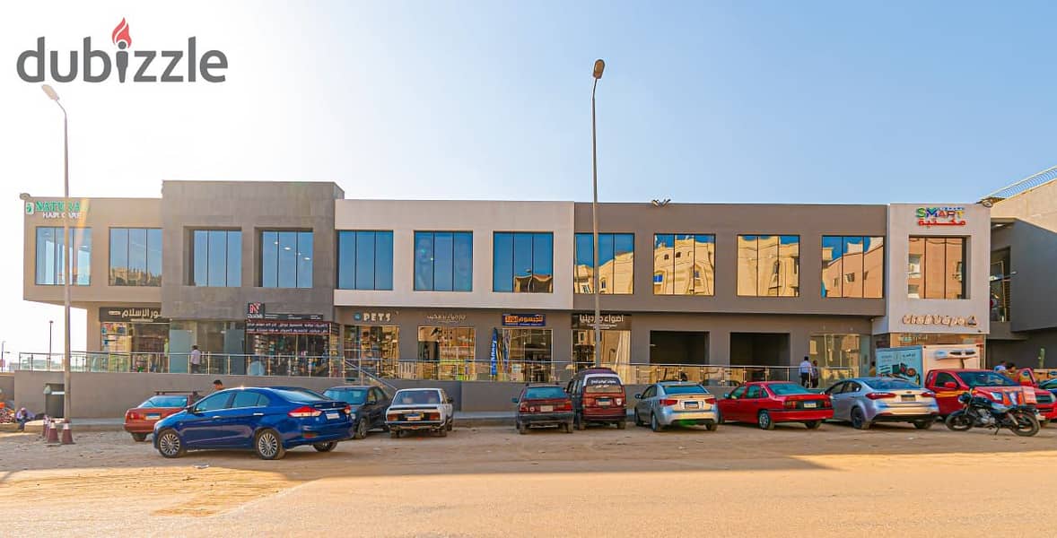 A store for sale in the Fifth Settlement, rented with a monthly return, in The Market Mall, next to the Gomla Market 7