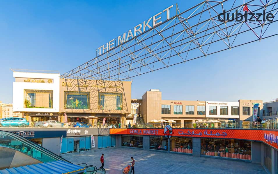 A store for sale in the Fifth Settlement, rented with a monthly return, in The Market Mall, next to the Gomla Market 11