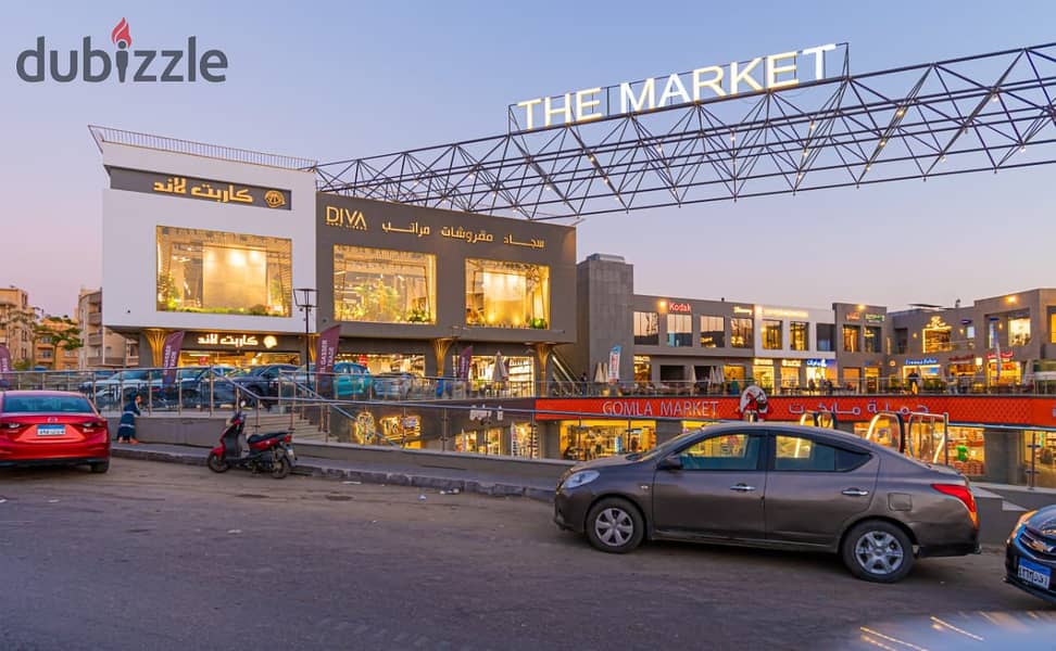 A store for sale in the Fifth Settlement, rented with a monthly return, in The Market Mall, next to the Gomla Market 12