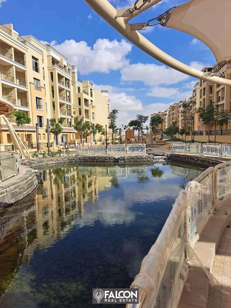 With a down payment of 557 thousand for sale, an apartment of 112 m on the landscape in front of Madinaty in Sarai New Cairo Compound, 8 years install 5