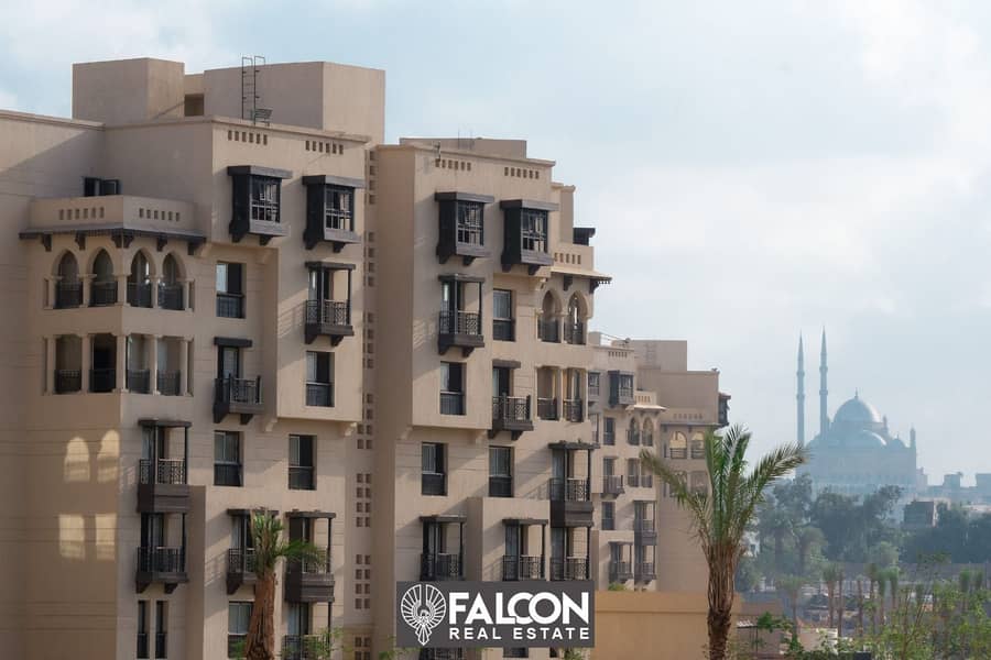 Immediate receipt of a 124 sqm apartment (finished) for sale in front of the Maqra El Oyoun wall in New Fustat Compound, in installments over 10 years 9