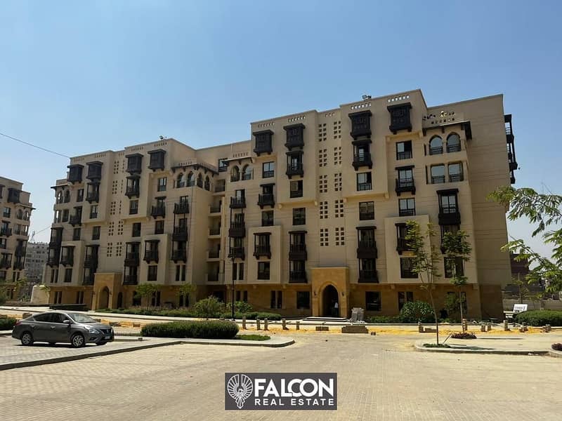 Immediate receipt of a 124 sqm apartment (finished) for sale in front of the Maqra El Oyoun wall in New Fustat Compound, in installments over 10 years 10