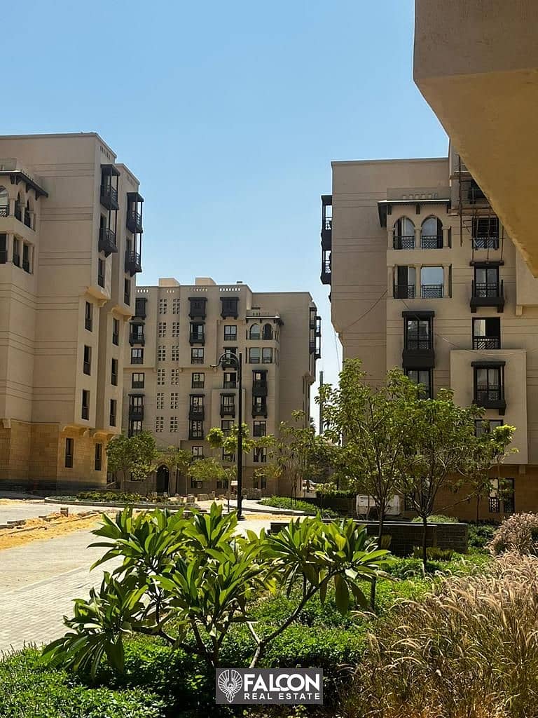 Immediate receipt of a 124 sqm apartment (finished) for sale in front of the Maqra El Oyoun wall in New Fustat Compound, in installments over 10 years 11