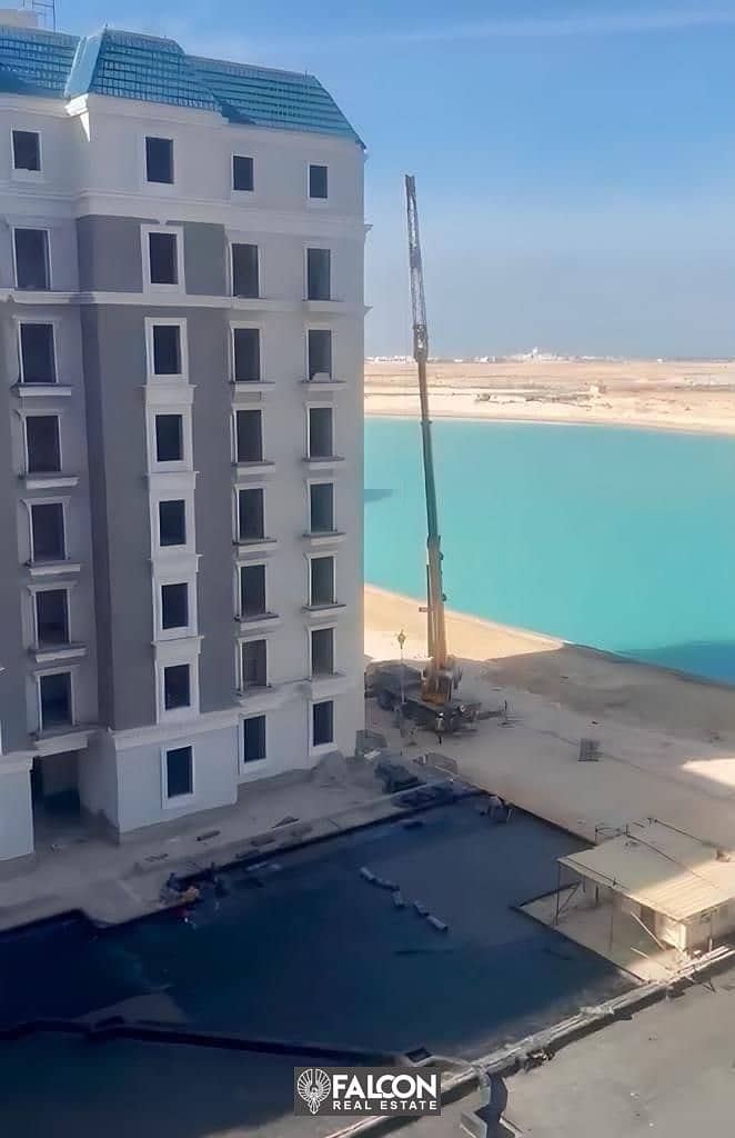 Receive immediately a 158m2 fully finished apartment with a sea view overlooking the lagoon and landscape for sale in the Latin Quarter, New Alamein 6