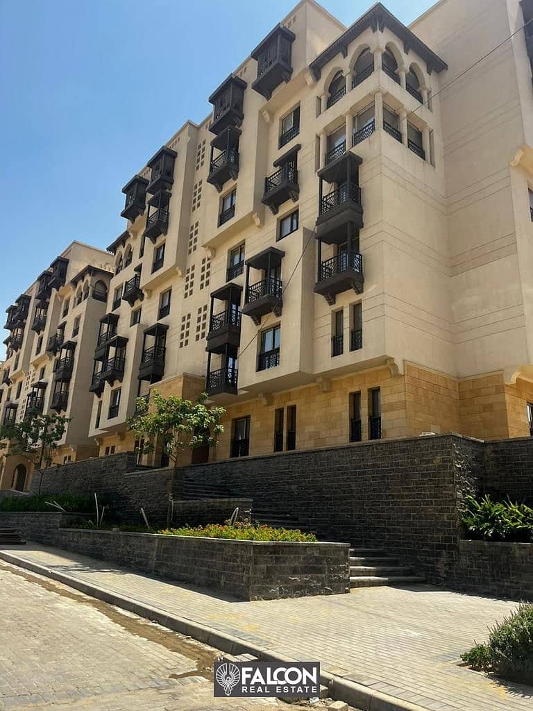 Immediate receipt of a 124 sqm apartment (finished) in front of the Majar El Oyoun wall in New Fustat Compound, in installments over 12 years. 1