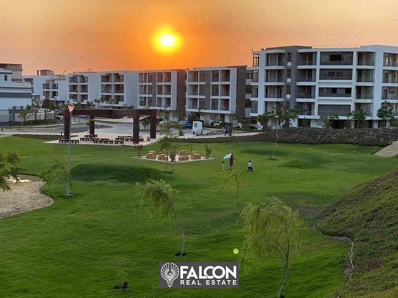 For sale, an apartment in the TAJ CITY compound, next to Cairo International Airport and directly on the Suez Road, with a 10% down payment and intere 1