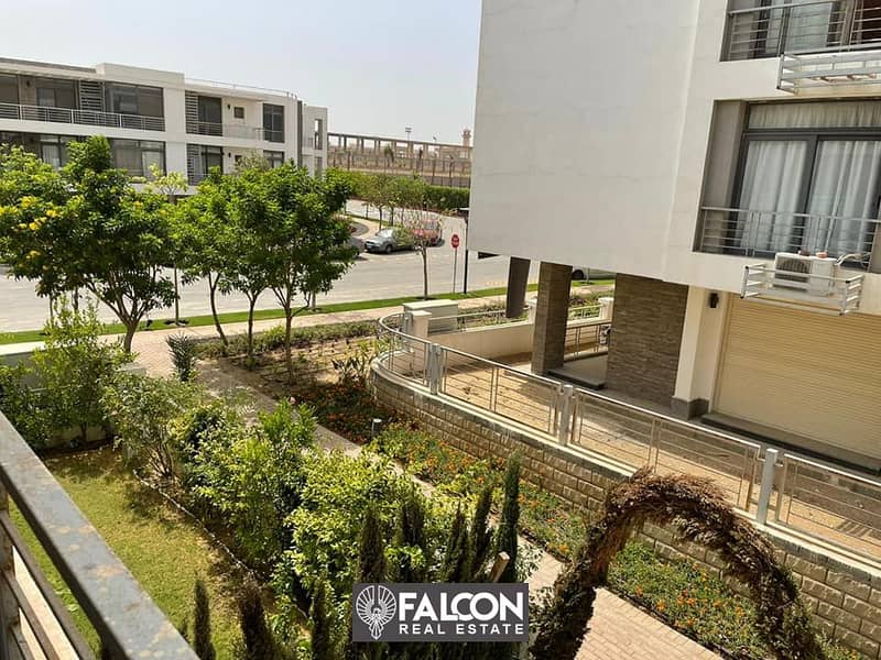 For sale, an apartment in the TAJ CITY compound, next to Cairo International Airport and directly on the Suez Road, with a 10% down payment and intere 4