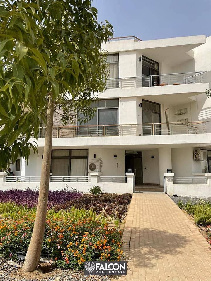 For sale, an apartment in the TAJ CITY compound, next to Cairo International Airport and directly on the Suez Road, with a 10% down payment and intere 5