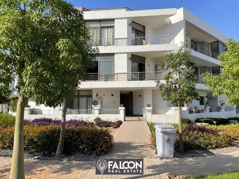 For sale, an apartment in the TAJ CITY compound, next to Cairo International Airport and directly on the Suez Road, with a 10% down payment and intere 10