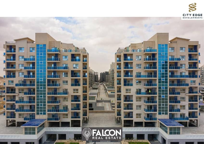 3-bedroom apartment ready to move in, 166 sqm, for sale, with a direct view of El Alamein Towers and super deluxe finishing in Downtown. 11