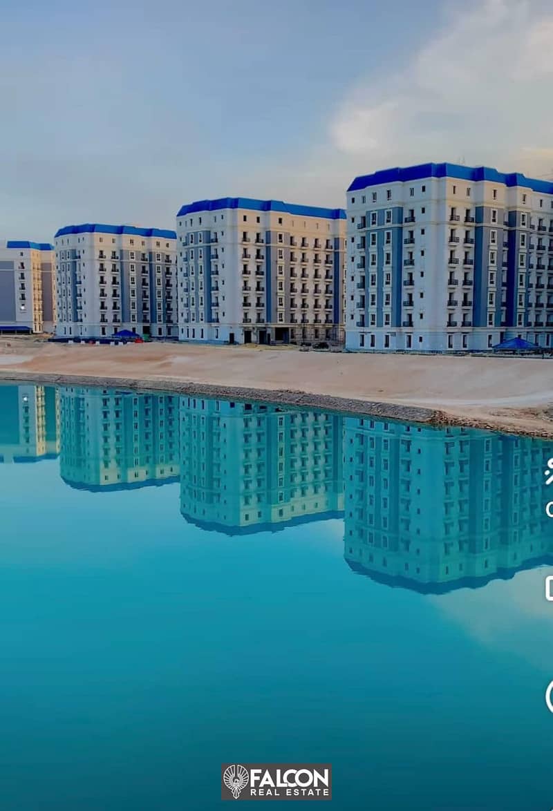 First row apartment on the Lagoon, ready for viewing, fully finished, distinguished, in installments, for sale in the Latin Quarter, New Alamein City 6