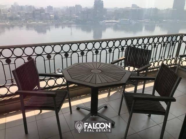 ((Receive now)) Apartment with hotel services, panoramic view of the Nile, fully furnished, next to the Hilton Hotel 4