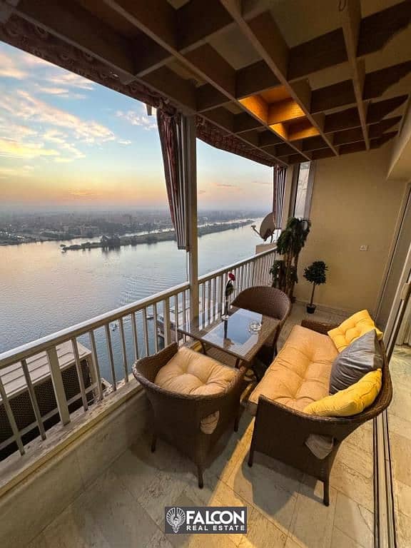 ((Receive now)) Apartment with hotel services, panoramic view of the Nile, fully furnished, next to the Hilton Hotel 5