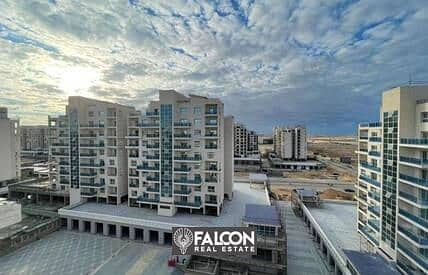 Fully finished two-bedroom apartment with sea view and El Alamein Towers in a prime location in Downtown - City Edge, New El Alamein 3