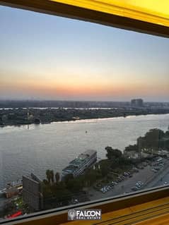 Hotel apartment for sale on the Nile Corniche, luxury finishes, furnishings, appliances and air conditioners, full hotel services 0