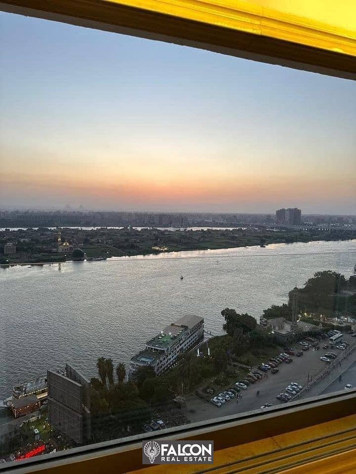 Hotel apartment for sale on the Nile Corniche, luxury finishes, furnishings, appliances and air conditioners, full hotel services 6