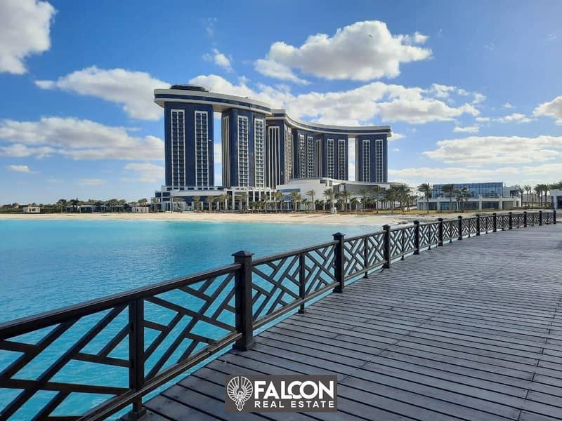 For sale, a hotel apartment directly overlooking the sea, finished and with air conditioning, on the North Coast in Al Alamein Towers 9