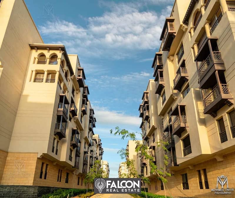 Immediately receive a fully finished apartment with installments over 12 years in the first compound in the center of the country in Al-Fustat Compoun 7