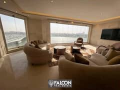 For sale, a hotel apartment, a bargain, 132 m, directly on the Nile, immediate delivery, fully finished, with air conditioners and furniture, in insta 0