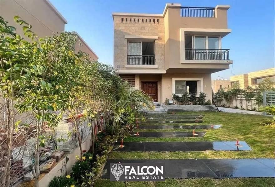 For sale, a detached villa with the largest golf view in Taj City, in front of the airport, on the Suez Road, with a 42% discount 1