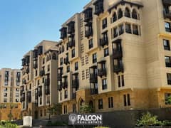 Two-bedroom apartment for sale, immediate delivery, in Arabesque Compound. . . Fustat. . . next to the wall of the Oyoun River, from the Urban Communities