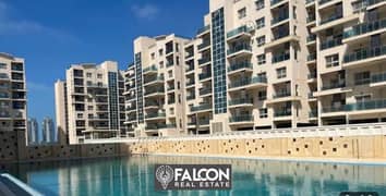 A fully finished two-bedroom apartment with a sea view in a prime location in Downtown - New Alamein - North Coast