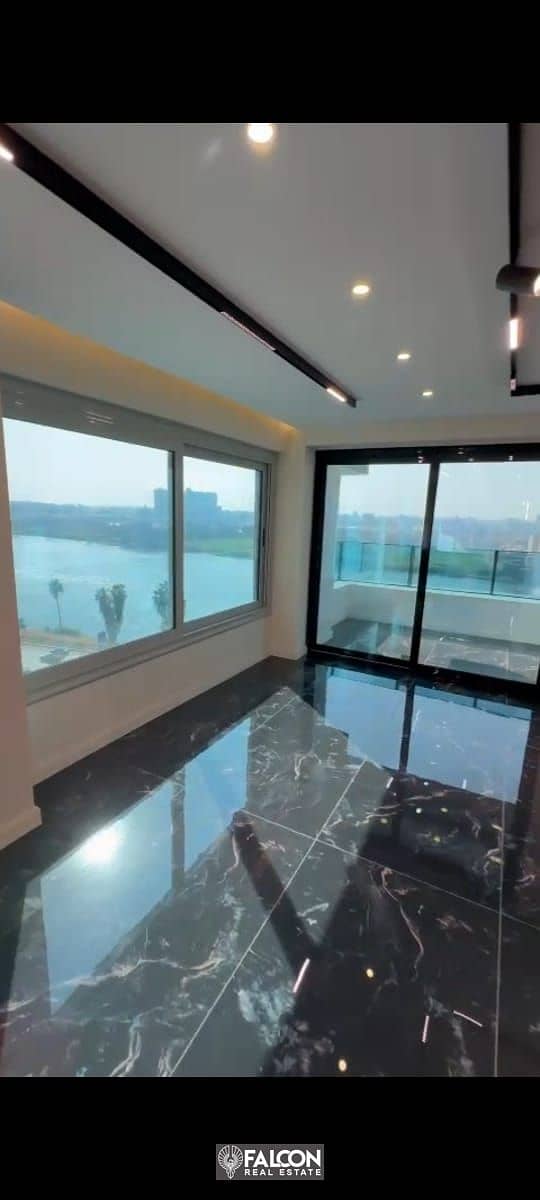 Hotel apartment on the Nile, immediate receipt, finished with furniture and appliances, with triple panoramic view of the Nile in REVE DU NIL Towers 1