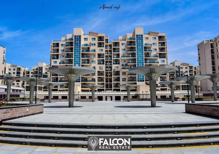 A fully finished two-room apartment with a sea view in a prime location in Downtown - City Edge, New Alamein 2