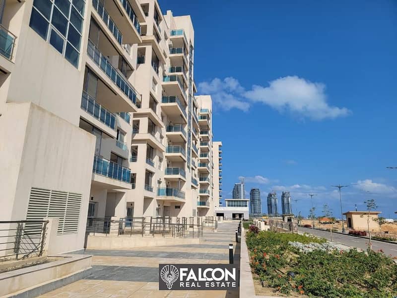 A fully finished two-room apartment with a sea view in a prime location in Downtown - City Edge, New Alamein 8