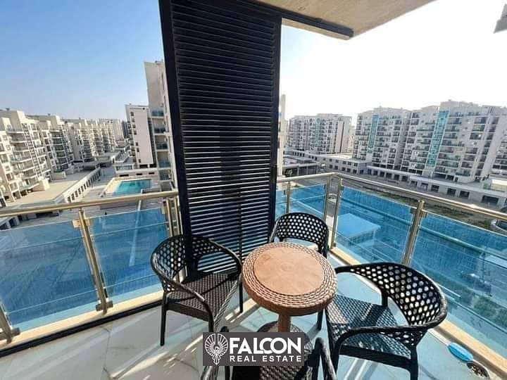 A fully finished two-room apartment with a sea view in a prime location in Downtown - City Edge, New Alamein 11