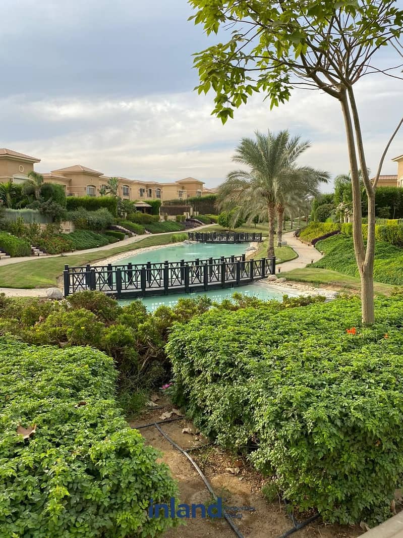 Villa for sale, immediate receipt, in an excellent location in New Cairo, Stone Park, with a landscaped view 2