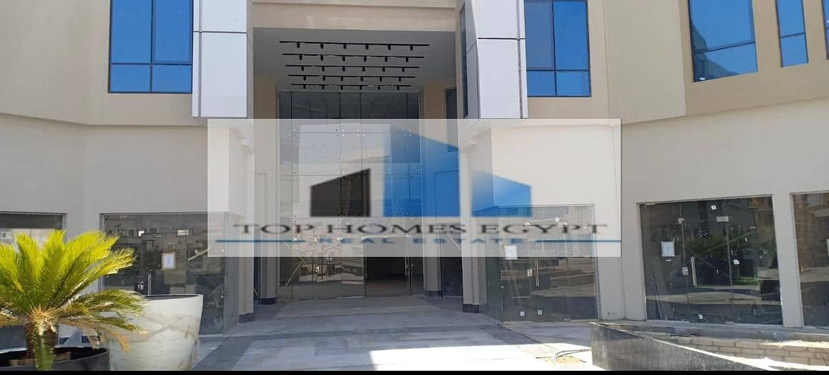 Commercial for rent 35m - prime location in Mivida , 5th settlement / محل للإيجار يطل على البلازا الرئيسية في ميفيدا 1