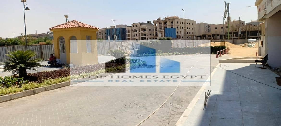 Commercial for rent 35m - prime location in Mivida , 5th settlement / محل للإيجار يطل على البلازا الرئيسية في ميفيدا 6