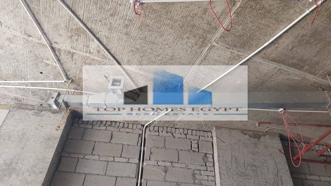 Office / Clinic for rent 102 sqm finished with ACs in Golden Square area  - 5th Settlement / مكتب او عيادة للإيجار متشطب بالتكييفات بالجولدن سكوير 1