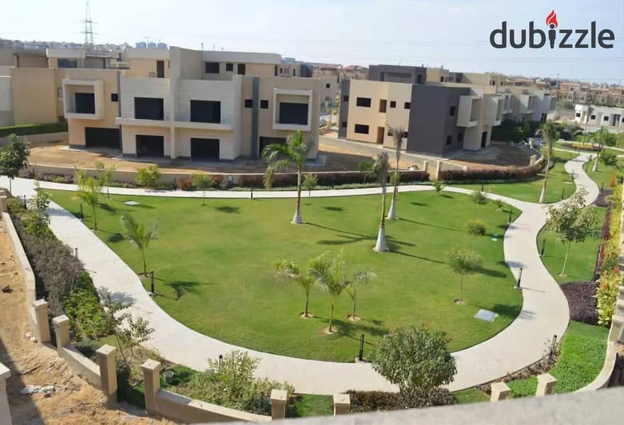 Best price for a townhouse villa, middle, immediate delivery, near Al Jazeera Club 2