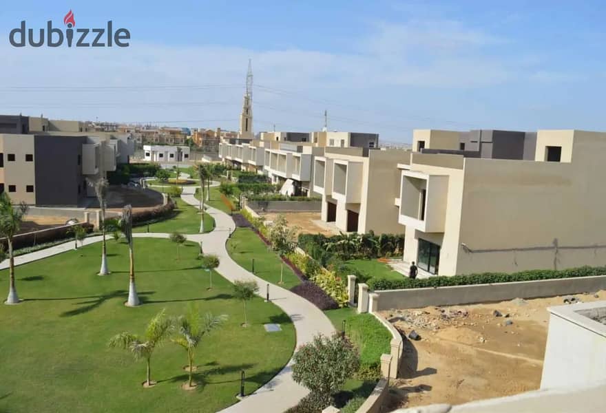 Best price for a townhouse villa, middle, immediate delivery, near Al Jazeera Club 8