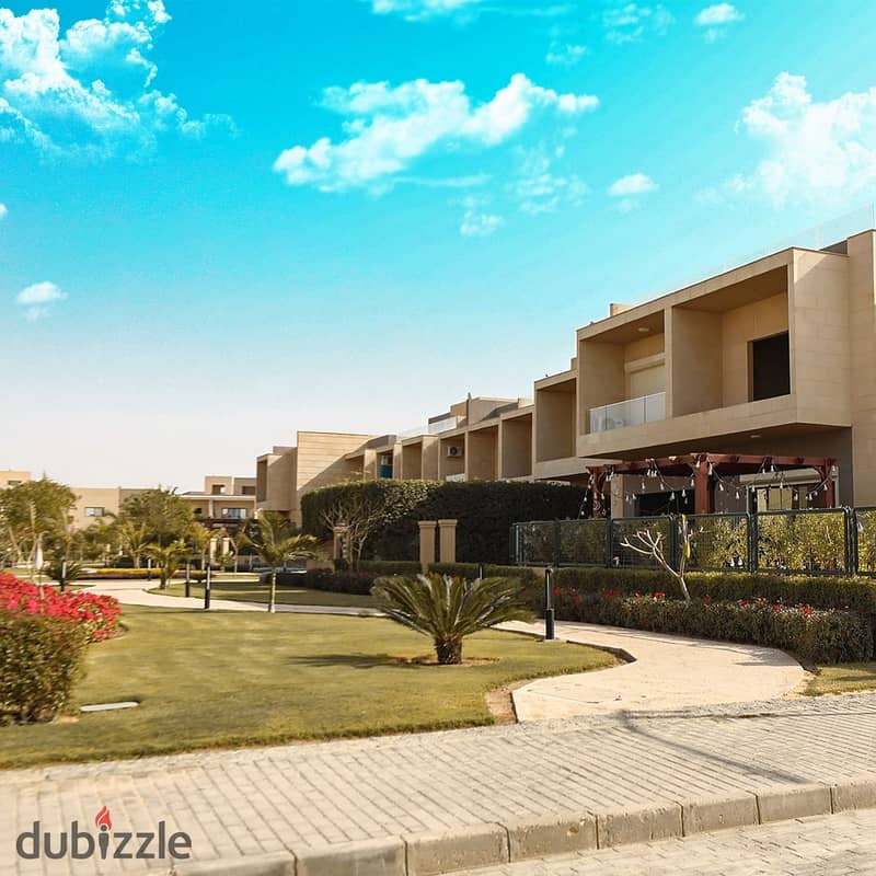 Best price for a townhouse villa, middle, immediate delivery, near Al Jazeera Club 12