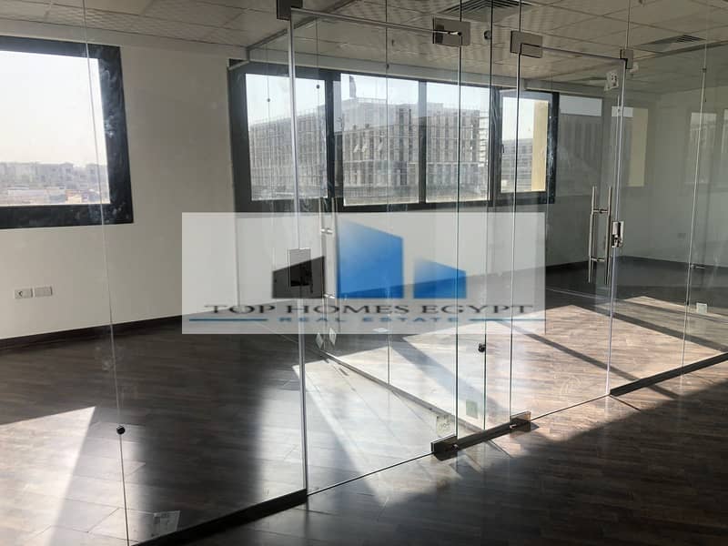 Office for Rent 117 SQM fully finished with ACs in Mivida / مكتب إداري للإيجار برايم لوكيشن متشطب بالتكييفات في ميفيدا 2