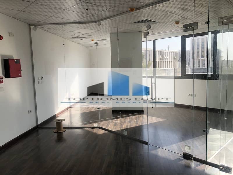 Office for Rent 117 SQM fully finished with ACs in Mivida / مكتب إداري للإيجار برايم لوكيشن متشطب بالتكييفات في ميفيدا 7