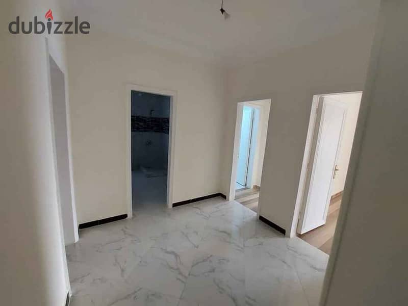 Apartment for sale, 167 sqm, at a snapshot price, in installments, finished, prime location, in Al Maqsad New cairo شقة للبيع 167 م   المقصد 2