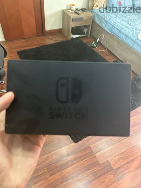 nintendo switch with extra controller and central controll system 2