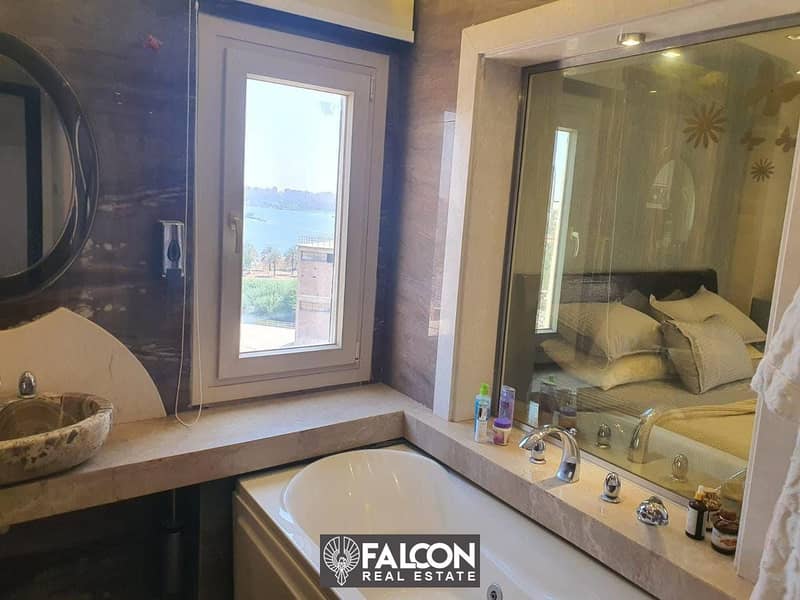 For sale, first row apartment on the Nile, fully finished, with air conditioners and furnishings + appliances, in installments over 5 years, in Rif de 8