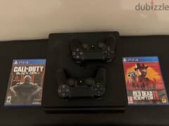 ps4 slim 500GB with 2 controls and 2 games 0