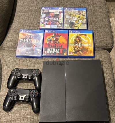 ps4 1 TB fat+ 2 original controllers +5 games