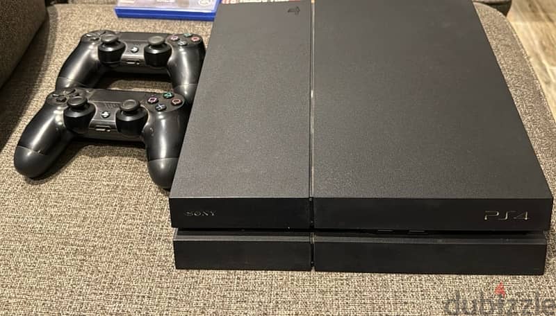 ps4 1 TB fat+ 2 original controllers +5 games 1