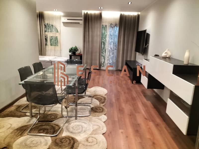 Furnished hotel apartments for rent, first residence in Al Rehab, ground floor with garden and private entrance, two bedrooms 5