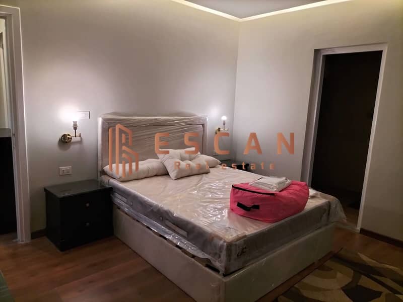 Furnished hotel apartments for rent, first residence in Al Rehab, ground floor with garden and private entrance, two bedrooms 9