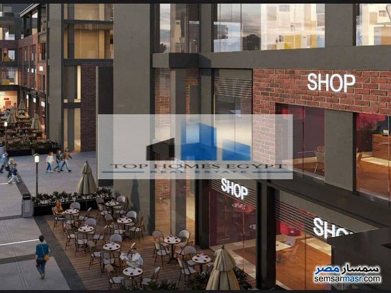 Mall for sale in a prime location in Bank Center St. , New Cairo / مول تجاري للبيع موقع مميز و حيوي في شارع منطقة البنوك 2