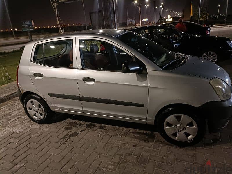 Kia Picanto 2006 فابريكه بالكامل اوتوماتيك 1