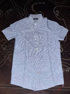 TOMMY HILFIGER
Original
NEGOTIABLE